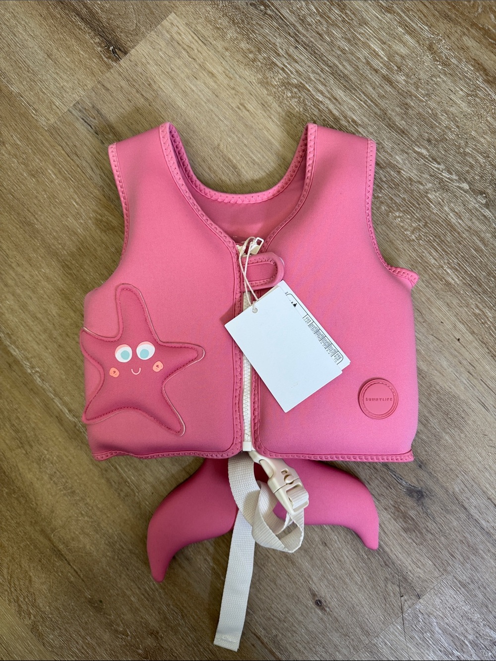 Sunnylife Pink Children’s Swim Vest with Starfish Accent